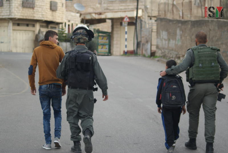 18-year old boy arrested in occupied Hebron and international banned from the entire West Bank