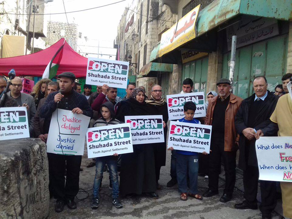 Youth Against Settlements holds press conference in front of Shuhada Street checkpoint to announce 2016 Open Shuhada Street campaign