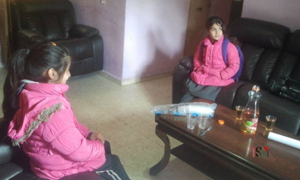 8 year old Hala, on the right side, and 9 year old Hadeel on the left, are the two youngest living in this home.