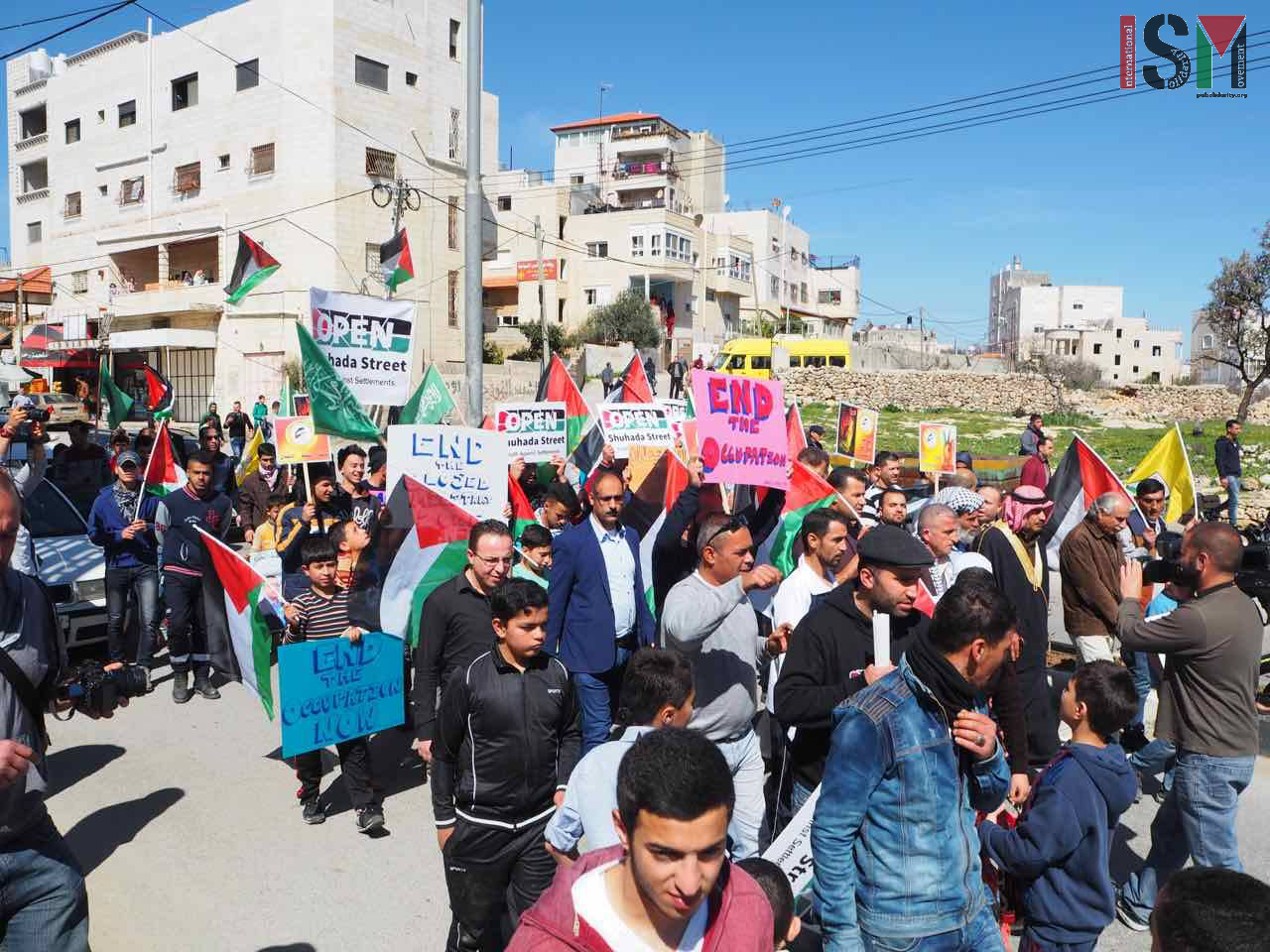 Demonstrators call for end to unjust restrictions in Hebron 22 years after Ibrahimi mosque massacre