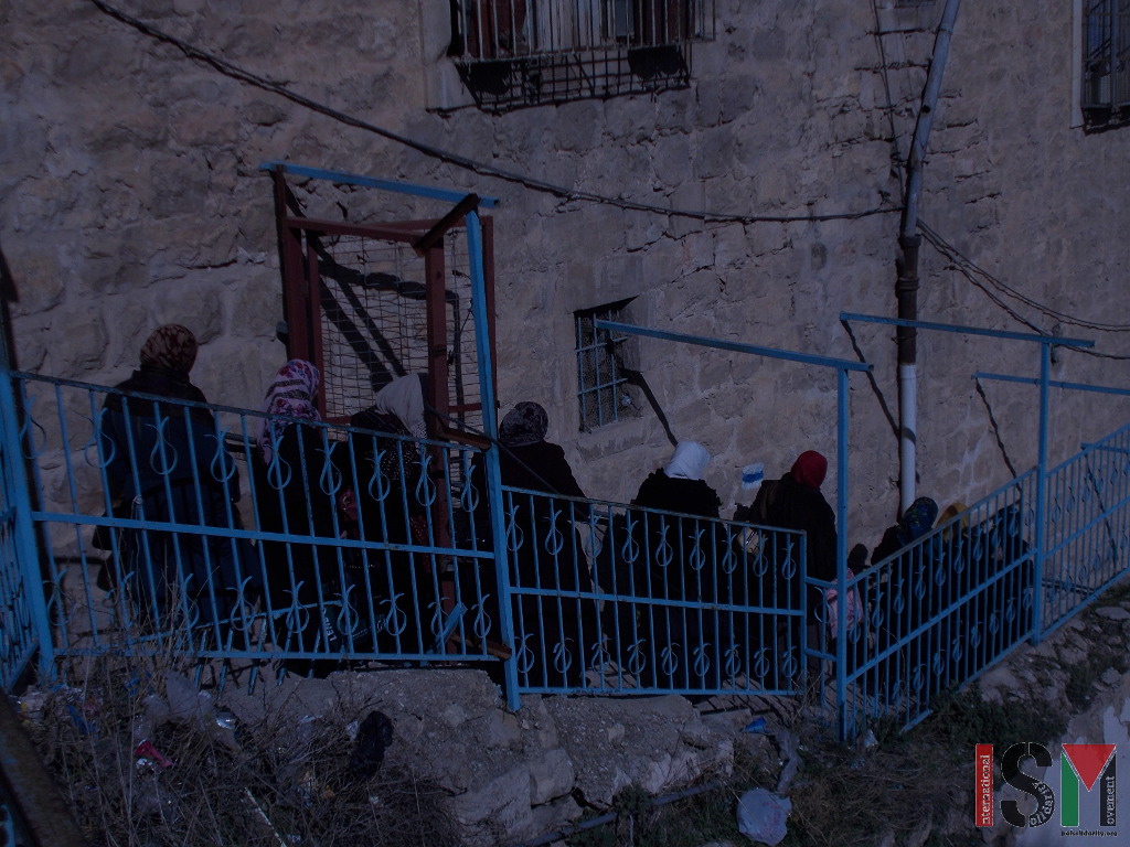 Female teachers protests the arbitrary instructions that further restrict access to the school compound in Hebron H2