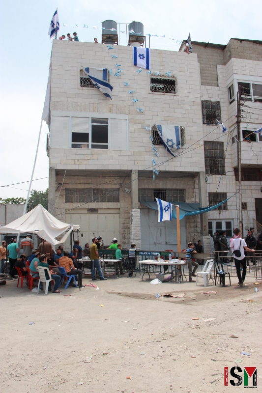 Settlers illegally occupy a Palestinian house in Hebron