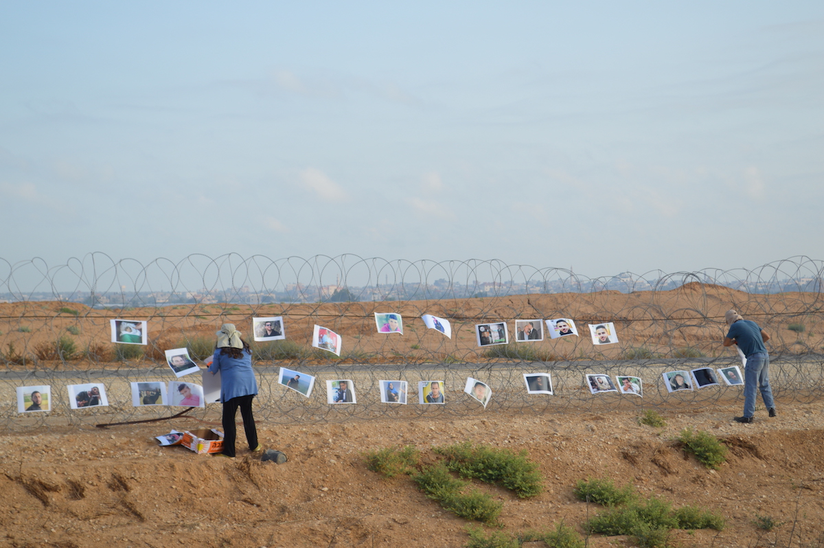 Jewish Israeli activists call for Palestinian right of return, hang portraits of protesters murdered in Gaza on Apartheid Wall