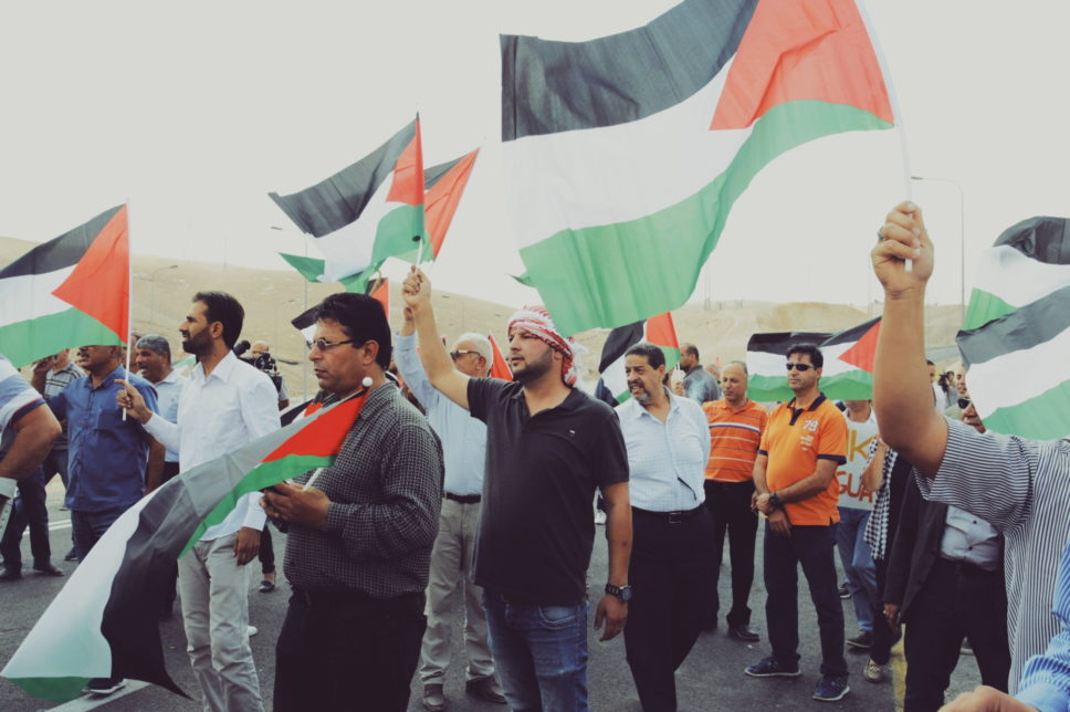 Activists stand in solidarity with the residents of Khan al-Ahmar