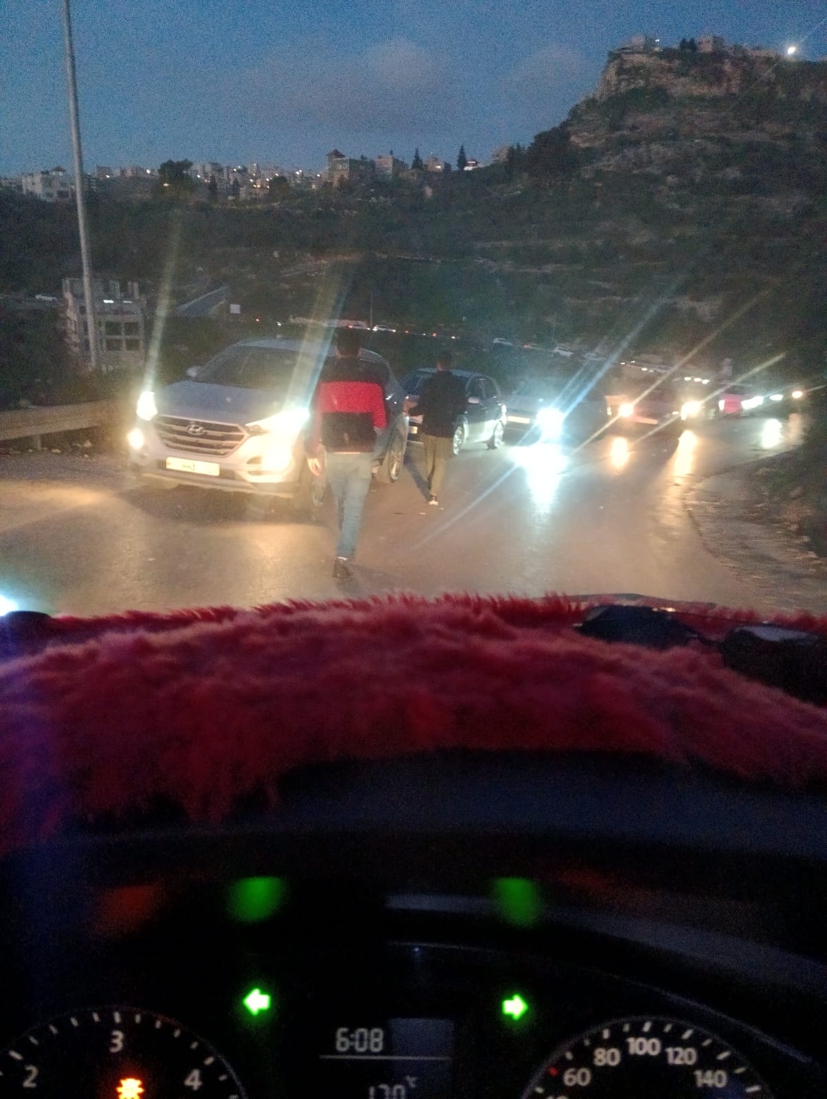 Cars delayed at an IOF checkpoint outside Nablus