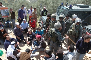 Villagers and supporters blocking jeeps