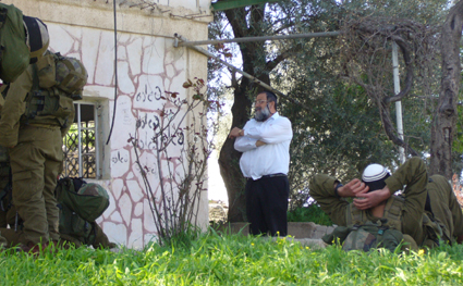 Soldiers and settlers trespass on Palestinian property