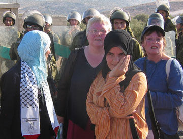 Two women from Belfast join Bil'in women in the West Bank during a demonstration against the occupation.