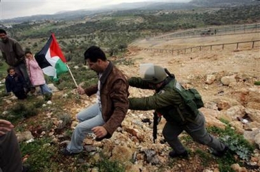 Protestors are pushed back by Israeli military in Bilin